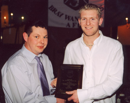 John Flood gets a memento of his Ireland U19 call-up